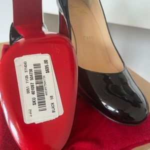 Christian Louboutin's Lady Gena 85mm patent leather pumps.